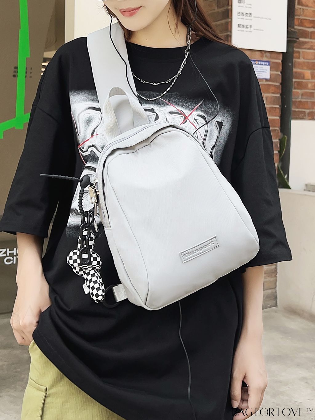 BagForLove - Pendant-Adorned Compact Chest Bag in Solid Color