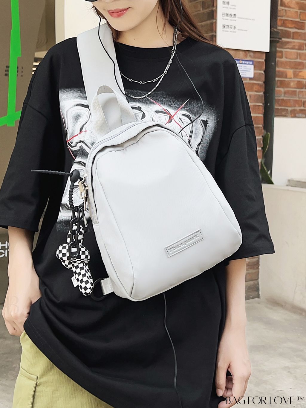 BagForLove - Pendant-Adorned Compact Chest Bag in Solid Color